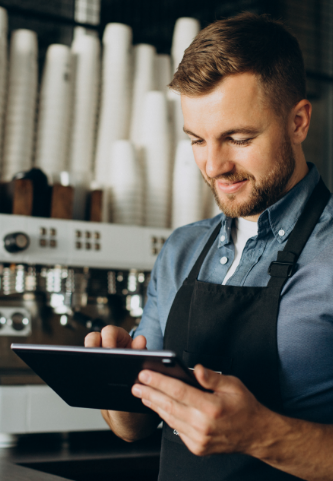 young-man-barista-coffee-shop
